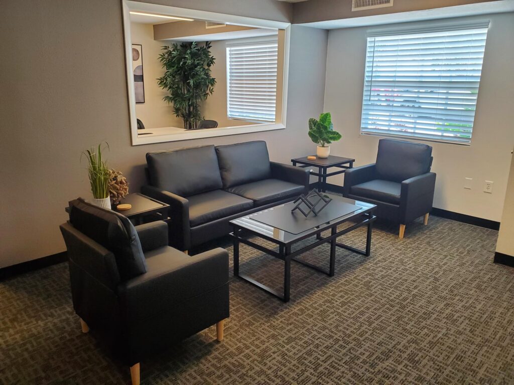 The comfortable and modern conference room for rent in Sarasota Florida at includes a casual seating area able to accommodate up to eight people. Learn more at brvosrq.com